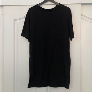 Long style black T shirt. Brand new.